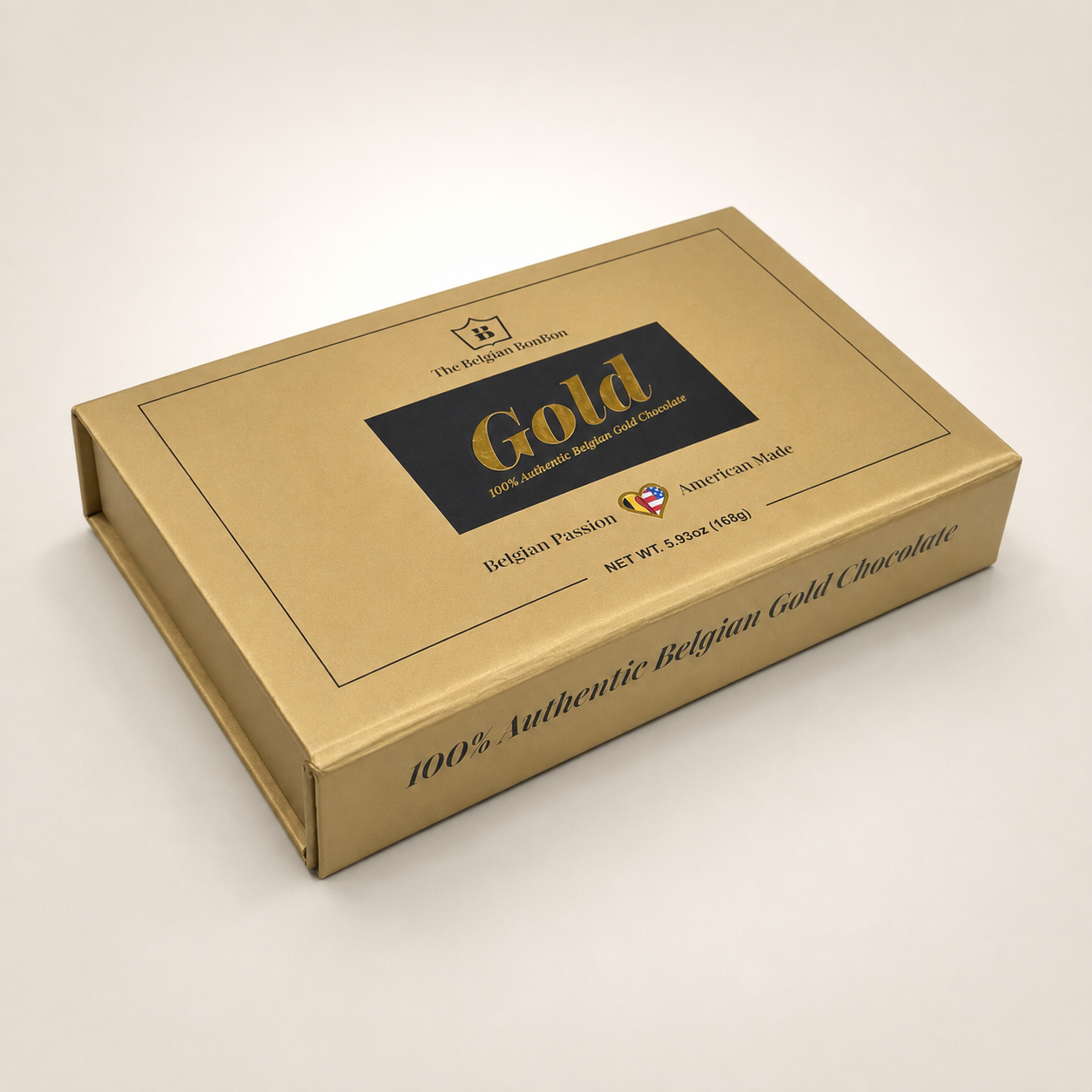 Closed metallic-gold rigid chocolate presentation box with black printed border and label